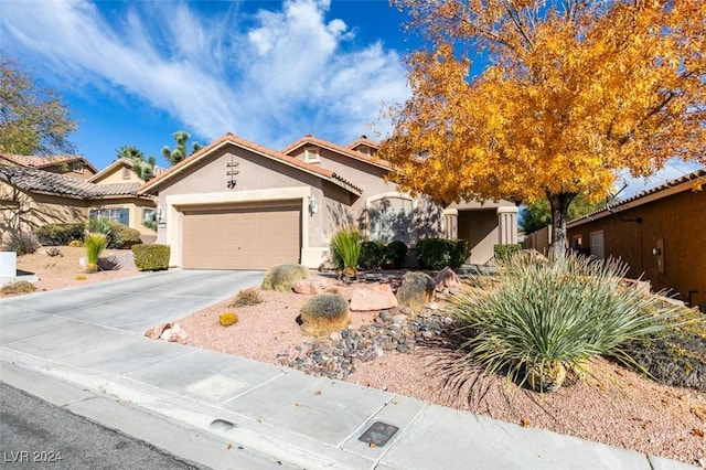 view of front of home with a garage