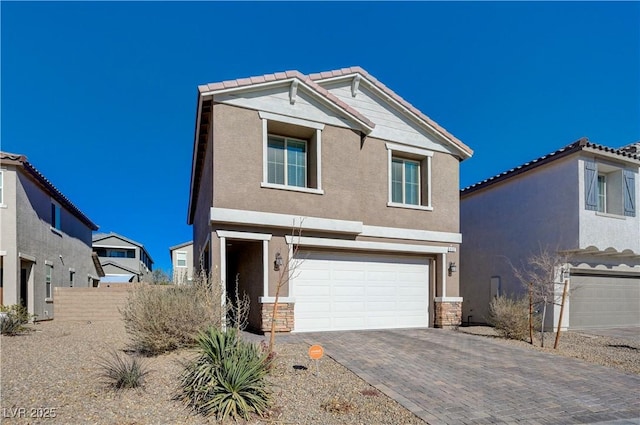 view of front of property featuring a garage