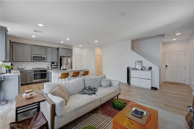 living room with light wood-type flooring