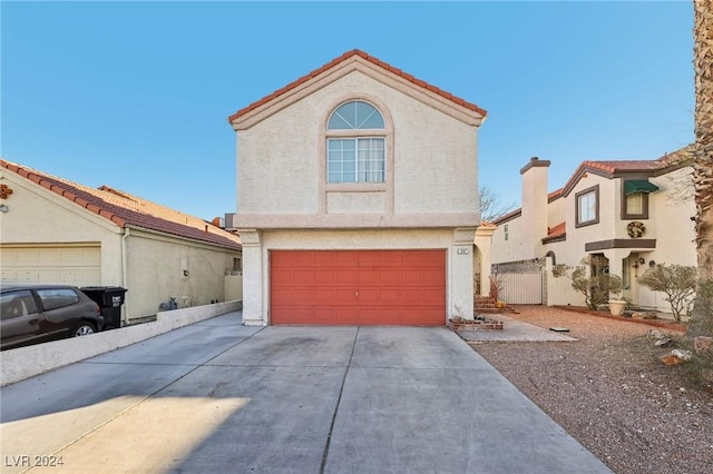 view of front of property featuring a garage