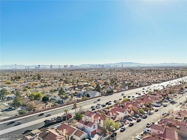 drone / aerial view featuring a mountain view