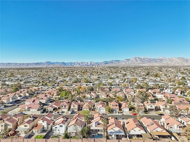 bird's eye view with a mountain view