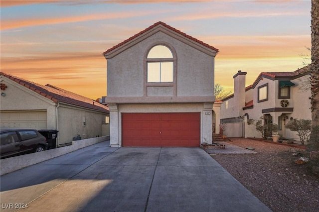 view of front of property with a garage