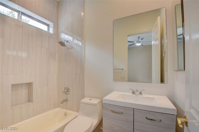 full bathroom with vanity, toilet, and tiled shower / bath