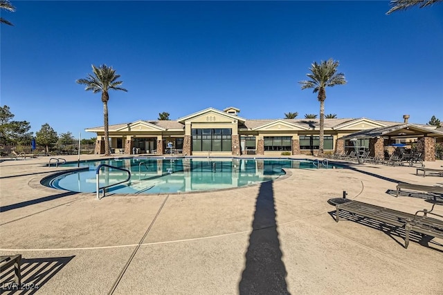 view of pool featuring a patio area