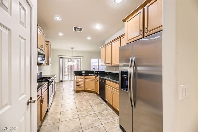 kitchen featuring light brown cabinetry, stainless steel appliances, sink, light tile patterned floors, and hanging light fixtures