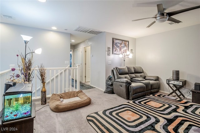 living room with carpet and ceiling fan