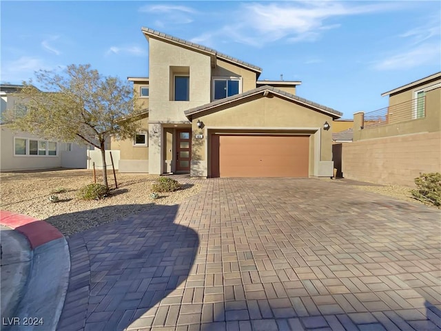 view of front of property featuring a garage