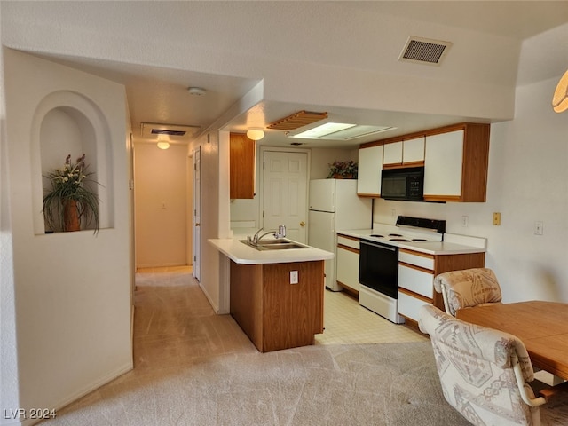 kitchen featuring light carpet, white appliances, kitchen peninsula, and sink