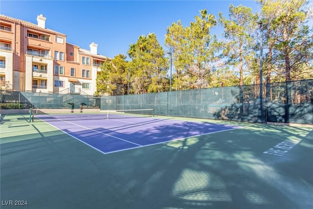 view of tennis court with basketball court