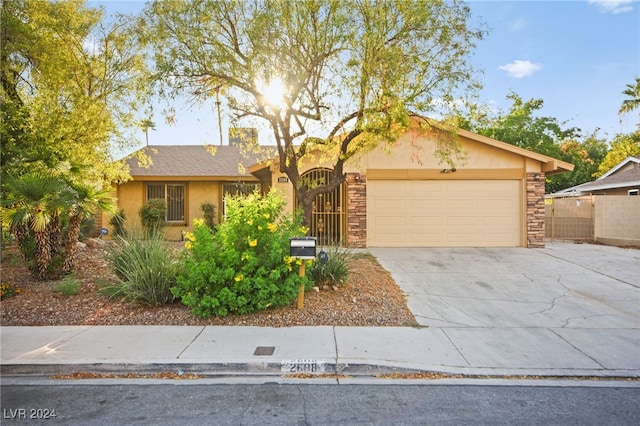 ranch-style home with a garage