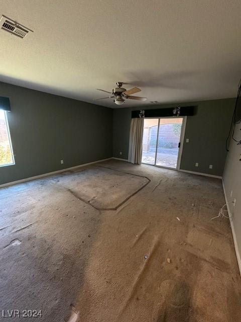 empty room featuring ceiling fan