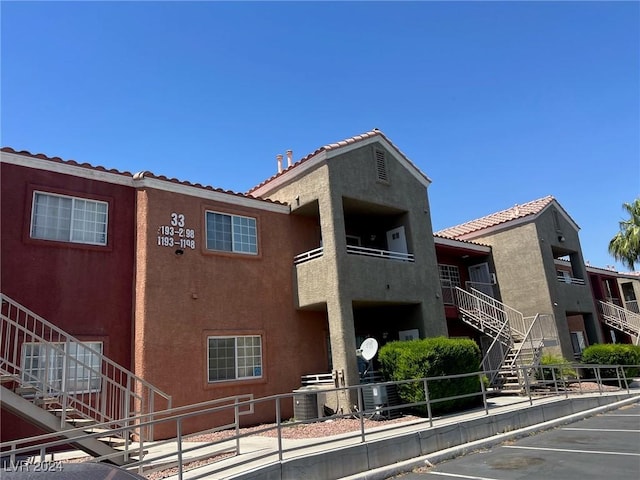 view of building exterior featuring central air condition unit