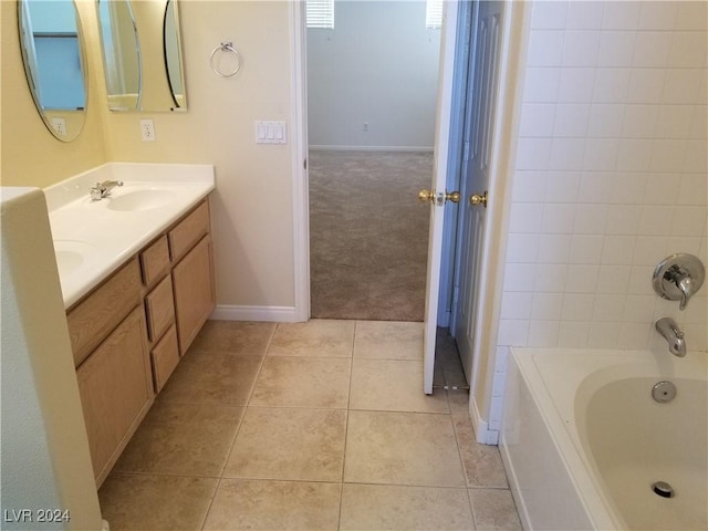 bathroom featuring tile patterned flooring and vanity