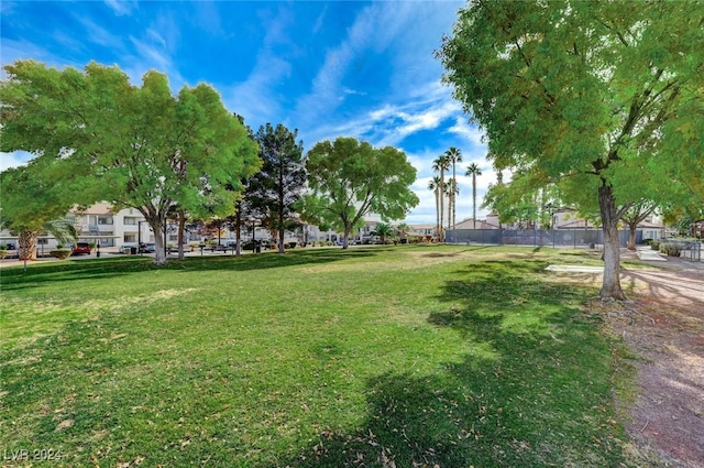 view of home's community featuring a yard