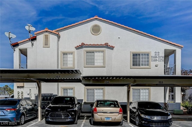 exterior space featuring a carport