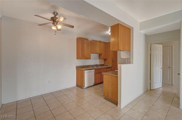 kitchen featuring dishwasher, ceiling fan, light tile patterned floors, and sink