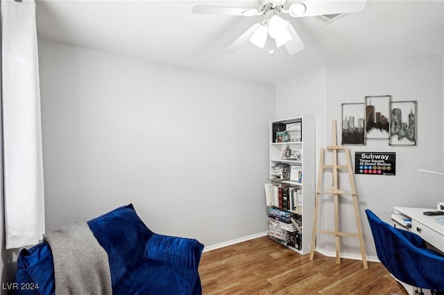 office with ceiling fan and wood-type flooring