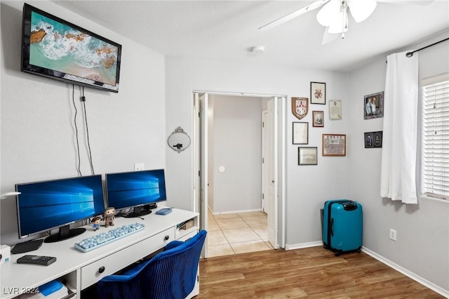 home office featuring hardwood / wood-style flooring and ceiling fan