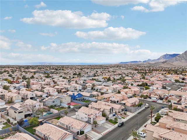 drone / aerial view featuring a mountain view