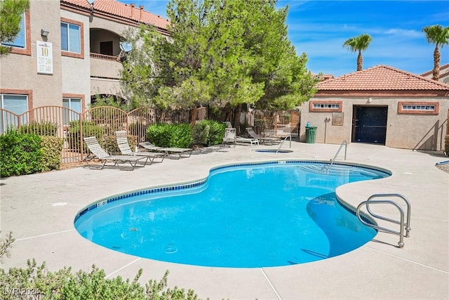 view of pool with a patio area