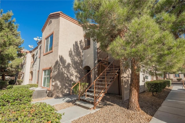 view of home's exterior featuring central AC