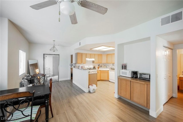 kitchen featuring white appliances, hanging light fixtures, ceiling fan, light brown cabinetry, and light hardwood / wood-style floors