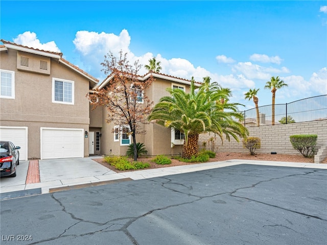 view of front of home with a garage