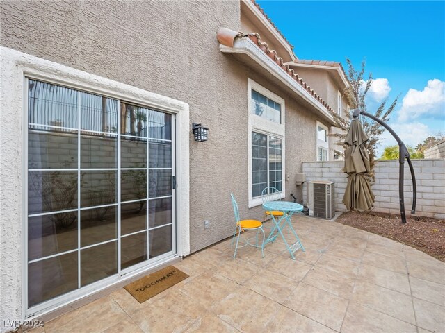 view of patio / terrace with central AC unit