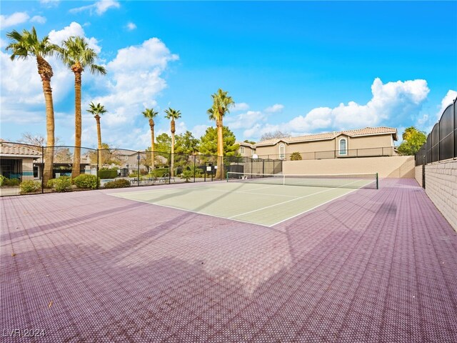 view of tennis court featuring basketball court