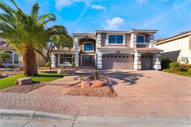 mediterranean / spanish-style home featuring a garage