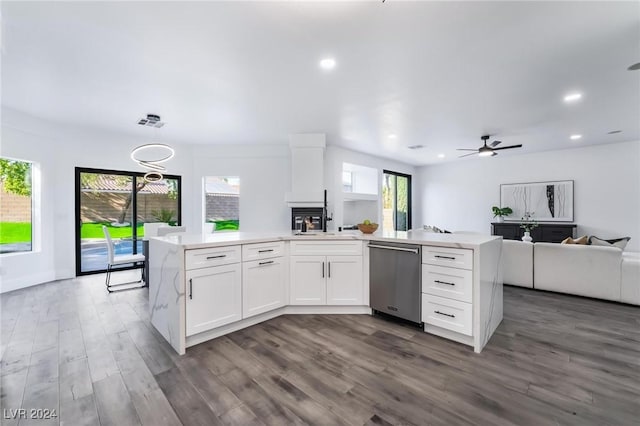 kitchen featuring ceiling fan, dishwasher, hanging light fixtures, dark hardwood / wood-style flooring, and white cabinets