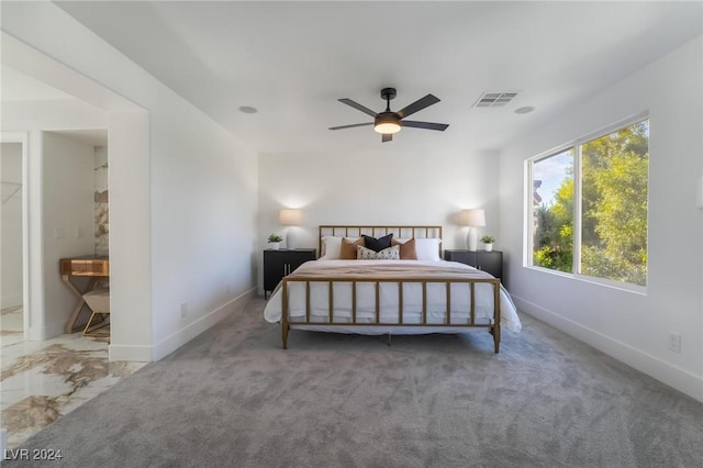 carpeted bedroom featuring ceiling fan