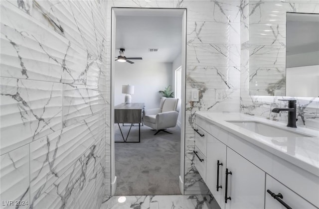 bathroom with vanity and ceiling fan