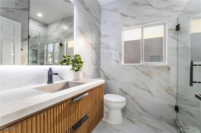 bathroom with vanity, toilet, tile walls, and walk in shower