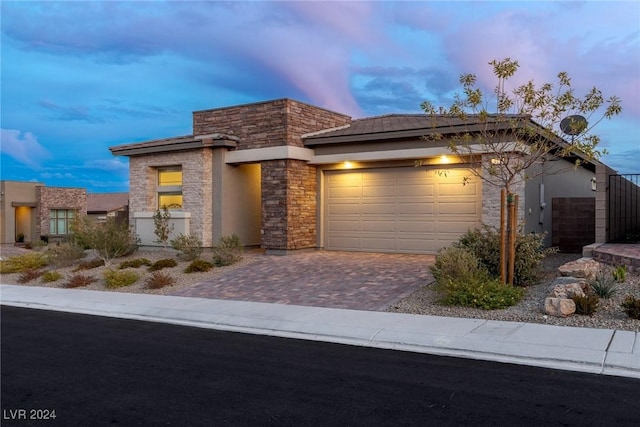 view of front of property with a garage