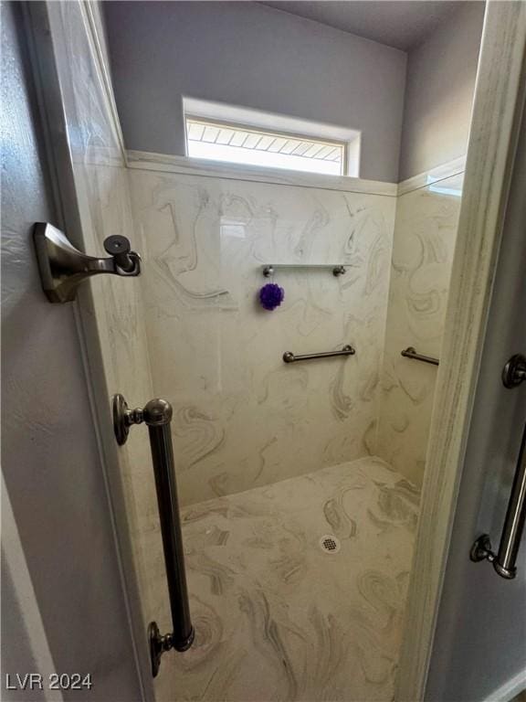 bathroom with a shower