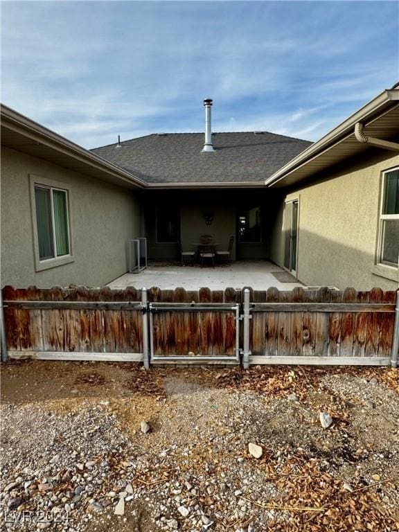 rear view of property with a patio