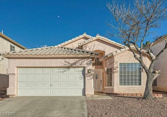 ranch-style house featuring a garage