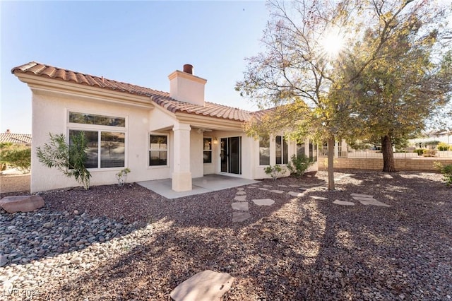 rear view of house featuring a patio area