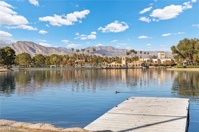 dock area with a water and mountain view