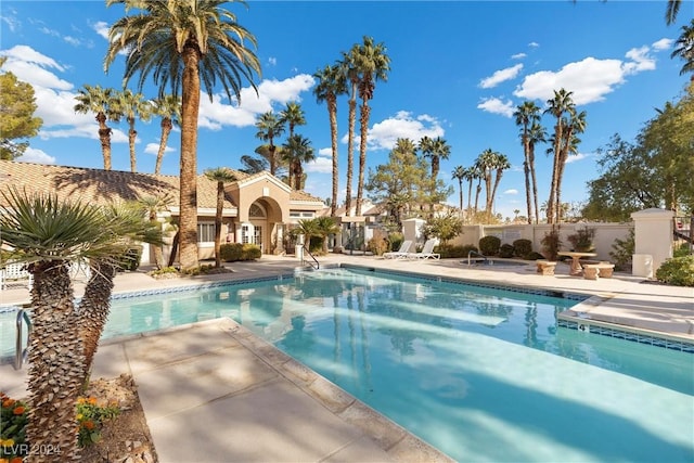 view of swimming pool featuring a patio