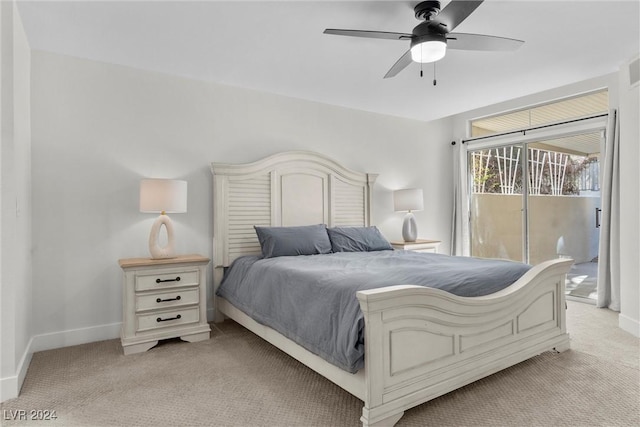 carpeted bedroom with access to outside and ceiling fan