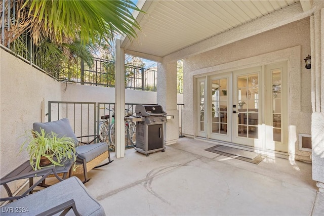 view of patio / terrace with grilling area and french doors