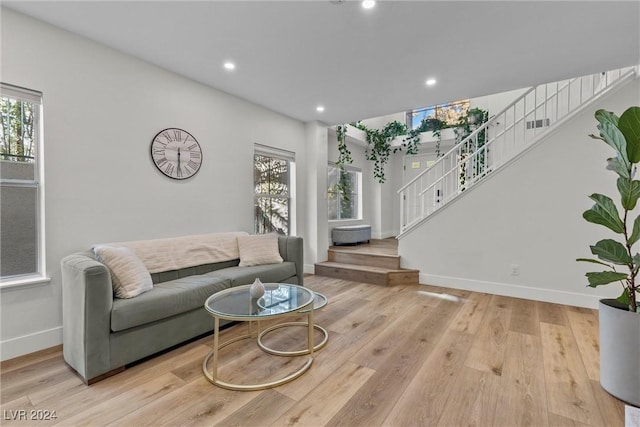 living room with light hardwood / wood-style flooring