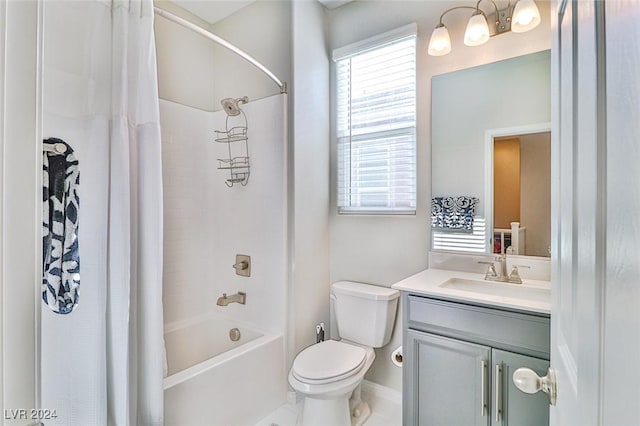 full bathroom featuring vanity, shower / bath combination with curtain, and toilet