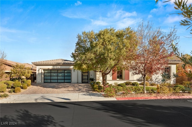 view of front of property featuring a garage