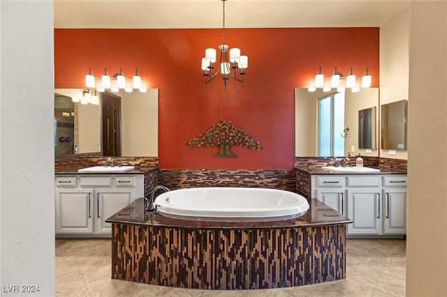 bathroom featuring a tub to relax in and vanity