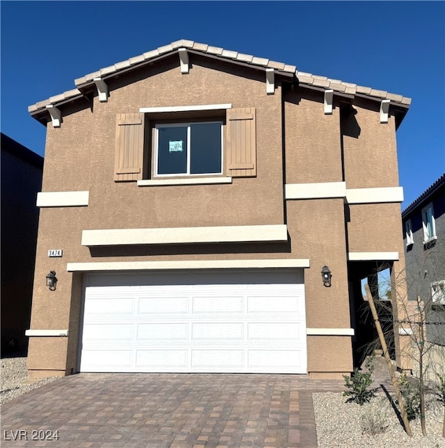 view of front of house with a garage