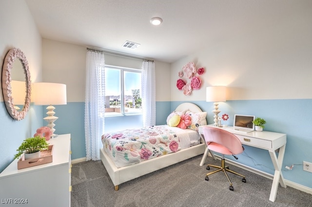 bedroom featuring dark colored carpet